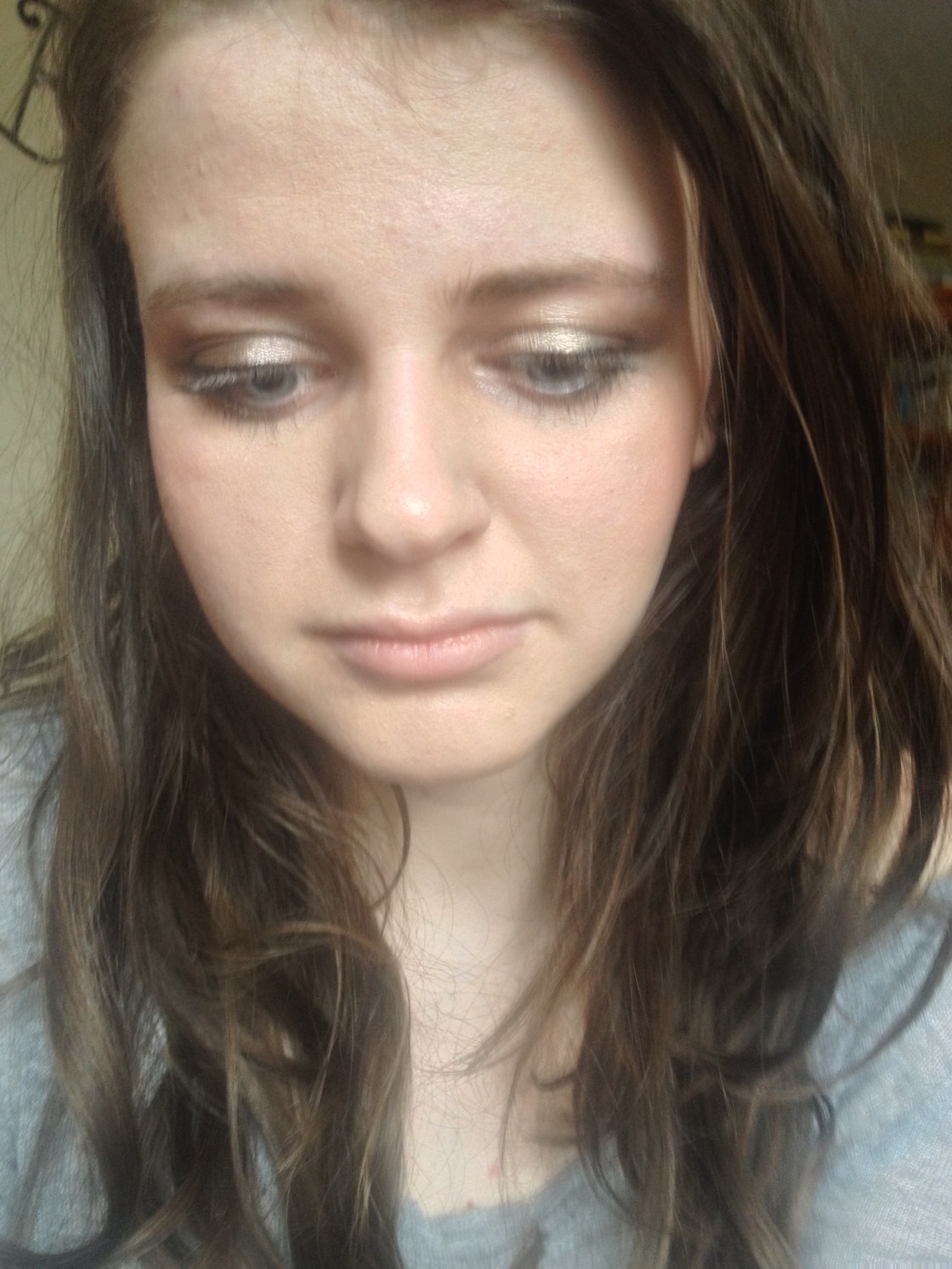 wearing the blush on the cheeks and maybelline as a base